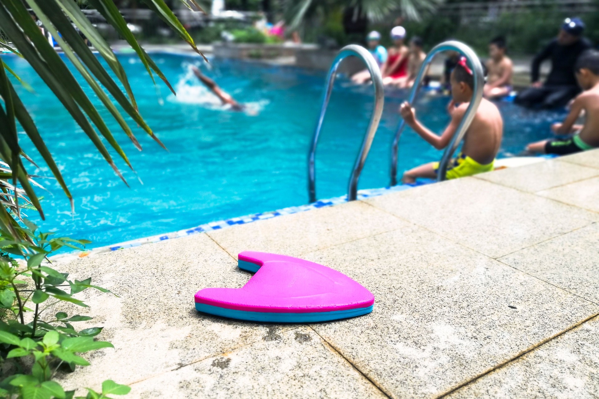 Hot summer, fun time at the children's swimming pool.